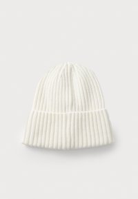 White knitted beanie hat with a ribbed texture. Features a folded cuff at the base. Overall seamless design with no visible logos or patterns.
