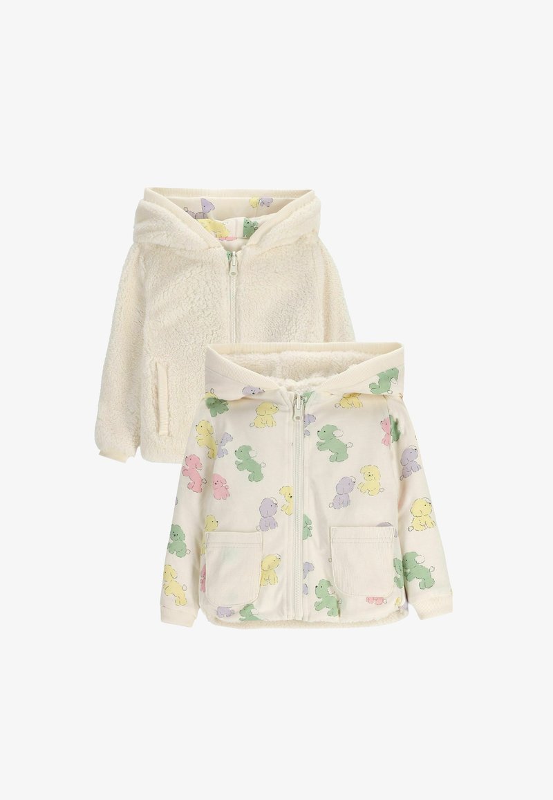 Futrzasta kremowa bluza z kapturem, zapinana na zamek błyskawiczny, z dwiema kieszeniami i podszewką w zwierzęcy wzór z pieskami w pastelowych kolorach. Materiał jest miękki i przytulny.