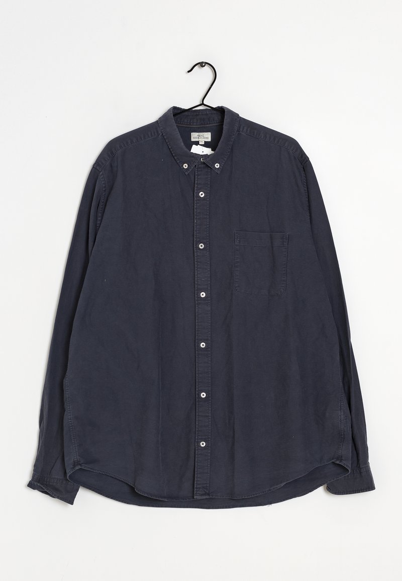 Chemise boutonnée bleu marine en coton, avec un col, des manches longues, une poche avant, et un ourlet droit avec une coupe décontractée.