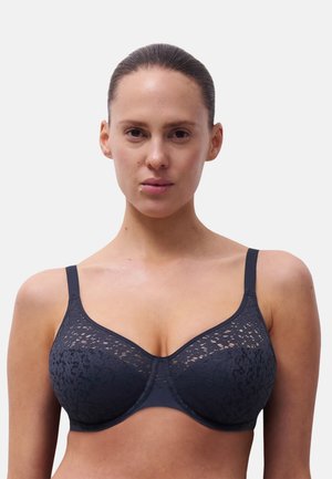 Dunkle Spitzen-BH mit Unterdrücken, glatten Cups und verstellbaren Trägern. Mit floralen Mustern und nahtlosem Design für Komfort und Unterstützung.