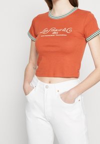 Levi's® T-shirt med print - orange