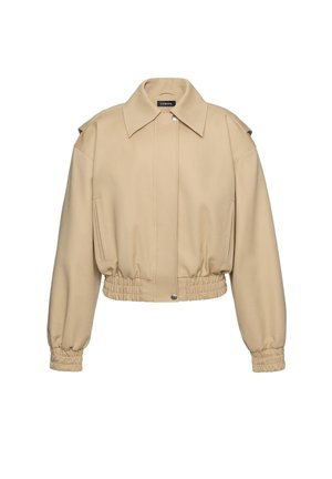 Beżowa krótka kurtka z szerokim kołnierzem, elastycznym dołem i mankietami, zapięciem na zatrzaski z przodu oraz kieszeniami z bocznym rozcięciem.