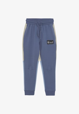 Blaue Baumwollmischung-Jogginghosen mit beigen und hellblauen Seitenpanels, elastischem Bund mit Zugband und einem schwarzen Markenlabel auf der Vorderseite.
