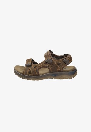 Brown sandal with adjustable straps, open toe, and padded footbed. Features textured accents and a durable rubber sole.