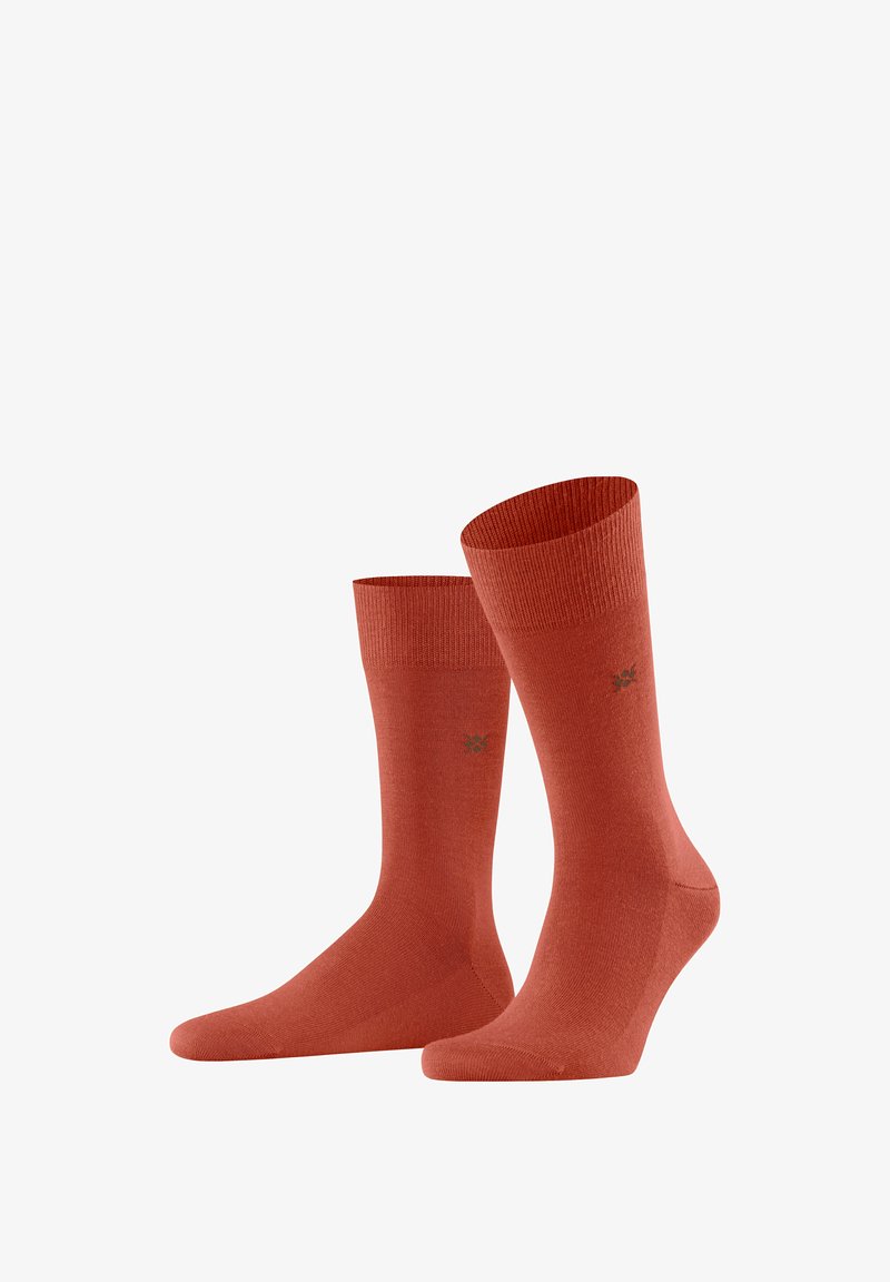 Calzini di cotone arancioni con bordi a costine e una superficie liscia. Presentano un piccolo logo vicino alla caviglia. Taglio alto, adatti per un abbigliamento casual.