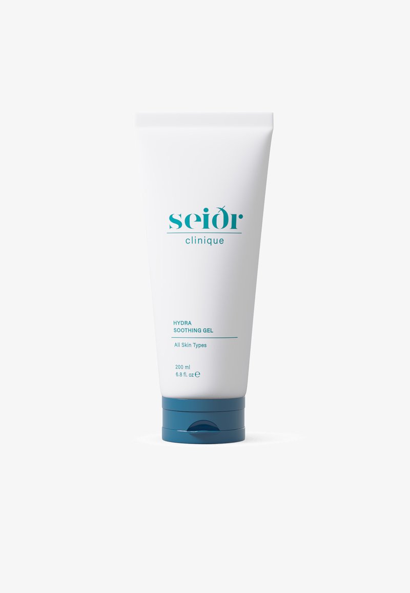Hvit tube med turkise detaljer, merket "seìdor clinique HYDRA SOOTHING GEL," inneholder 200 ml; designet for alle hudtyper.