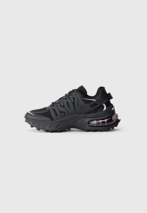 Black athletic sneaker with raised sole, transparent air cushion, branded DSQ2 on side, patterned laces, and textured outsole against white background.