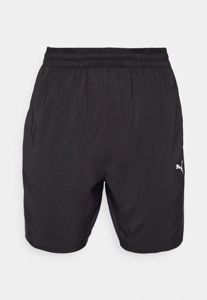 Svarte sportsshorts med elastisk midje, laget av lett stoff, med en hvit Puma-logo på nedre høyre side.