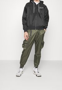 Nike Sportswear Kapsáče - khaki