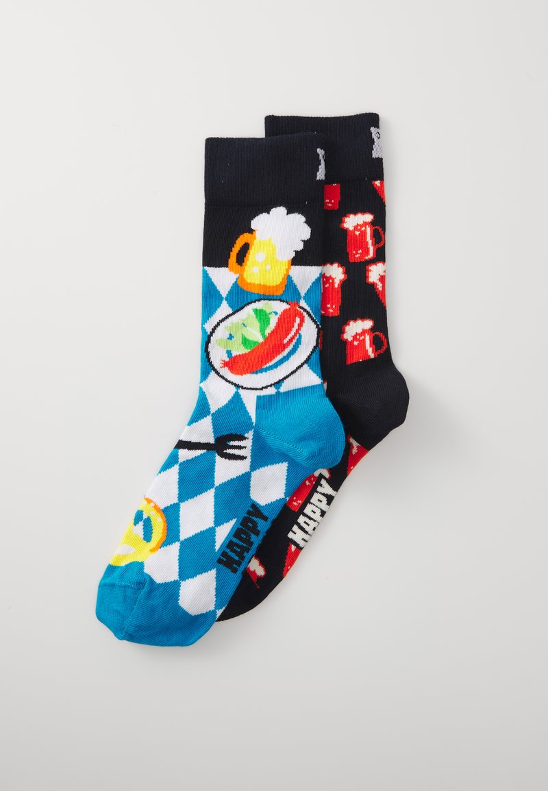 Spalvoti komandos kojinės su mėlyna ir balta deimantų raštu, vienoje pusėje vaizduojant maistą ir gėrimus, o kitoje pusėje juodas fonas su raudonomis puodelėmis.