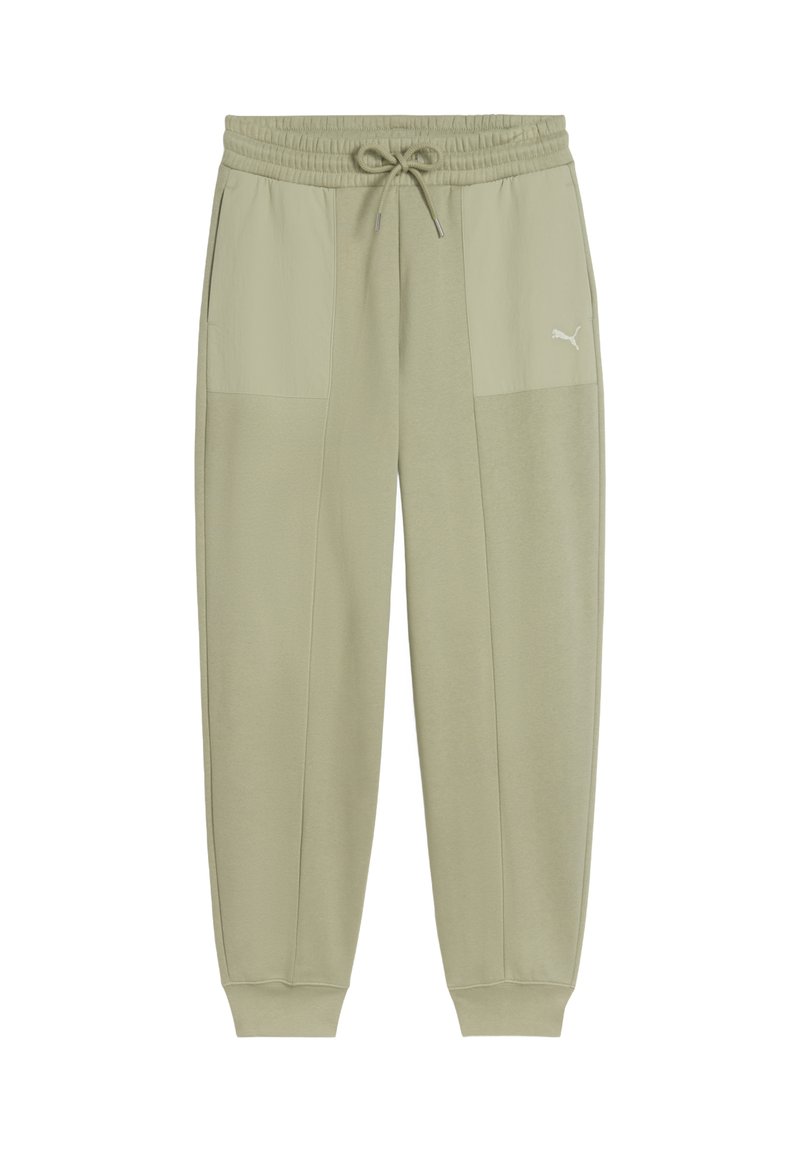 Lys grønne sweatpants med elastisk talje, snøre og sidelommer. Har et tofarvet design og lille logo detalje på det ene ben.