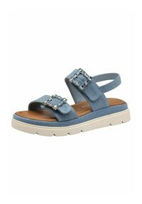Denim sandaler med två justerbara remmar och stora geometriska spännen, med en tan-färgad fotbädd och vit gummisula för bra grepp.