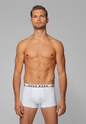 Weiße Boxershorts mit einem schwarzen Logo-Bund "HUGO BOSS", aus gleitendem Stoff, mit einer körpernahen Passform und einem bequemen Schnitt.