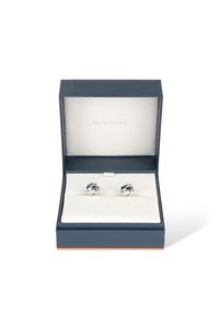 Silver cufflinks with a swirl design, presented in a navy blue box with a textured interior and white cushion insert.