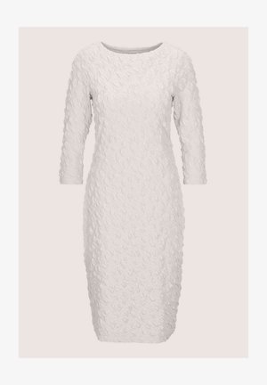 Textured white dress with long sleeves, a round neckline, and a fitted silhouette. Features a crinkled fabric pattern throughout.