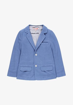 Blazer bleu clair en tissu texturé, avec deux poches avant, une petite poche poitrine et deux fermetures à bouton. Doublure intérieure.