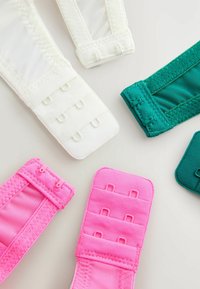 Kleurige banden in pink, wit en groen. Gemaakt van textuurstof, met haken en lussen voor bevestiging en een gladde afwerking.