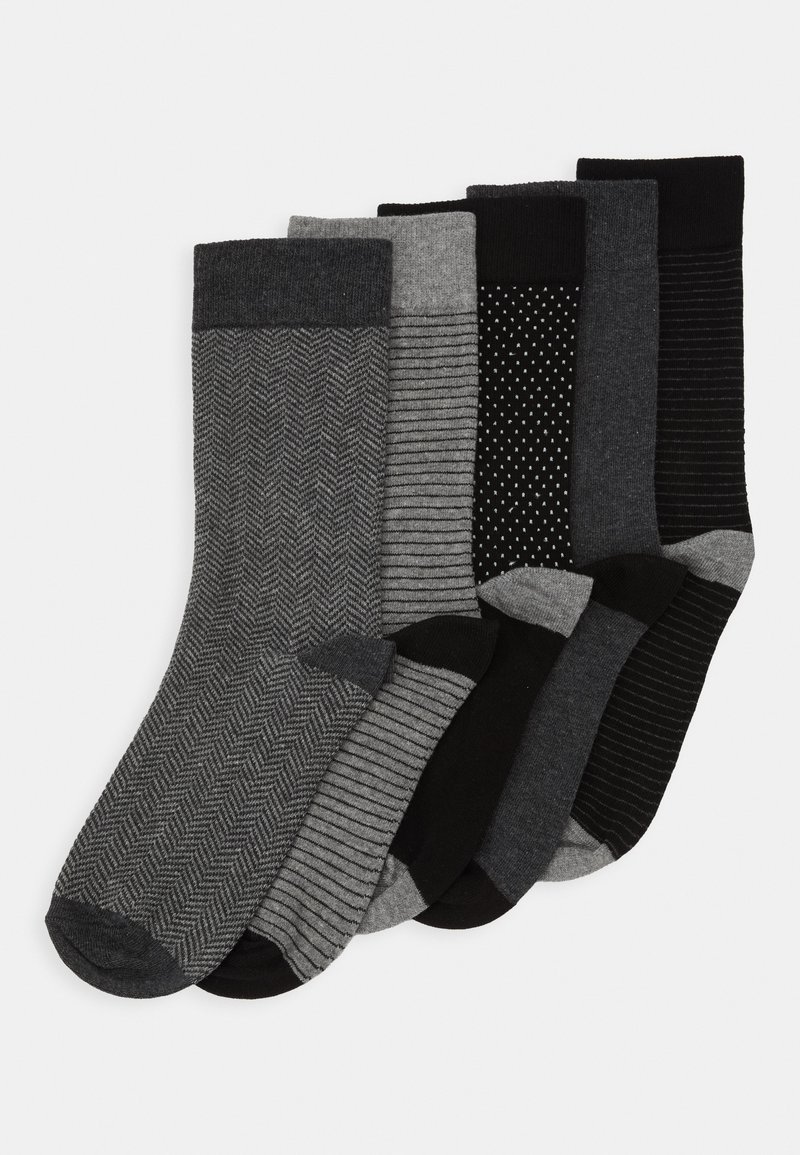 Five pairs of socks in shades of gray and black, featuring herringbone, striped, and dotted patterns with contrasting cuffs.