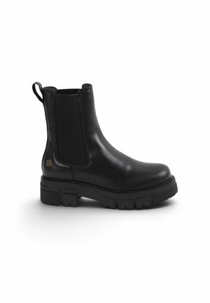 Black leather ankle boot with chunky sole, elastic side panel, and pull tab at the back, shown in profile facing right.