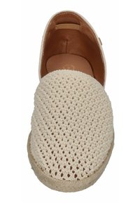 Cream crochet slip-on shoe with a round toe, jute accents around the sole, and a soft leather interior. Features a woven upper.