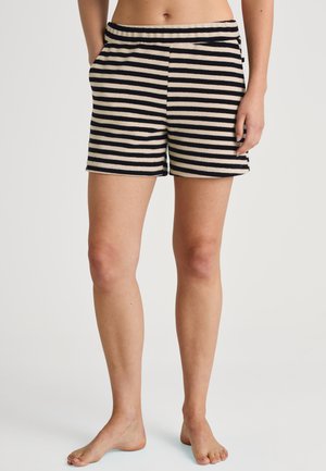 Shorts rayés en tissu doux avec une large taille élastique, des rayures horizontales bleu marine et crème, et deux poches latérales.