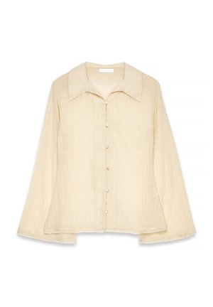 Beige Langarmshirt mit spitzem Kragen, Knopfverschluss und strukturiertem Stoff. Der Saum ist leicht abgerundet und hat eine lockere Passform.