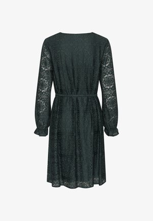 Tumedat roheline pitskleit pikkade varrukatega, mustriline tekstuur, sobituv vöökoht ja laienev seelik. Omab peent läiget ja lainelisi mansette.