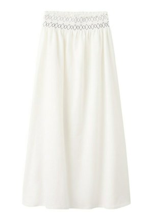 Jupe longue blanche avec taille élastique et détail de couture à motif losange noir.