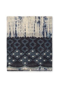 Cotton scarf featuring a light beige upper section with blue vertical stripes, transitioning to a dark blue geometric pattern at the bottom.