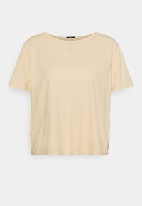 Beige kortärmad T-shirt med rund halsringning. Tillverkad av ett mjukt, något strukturerat tyg, med en avslappnad passform och enkel design.