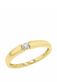 Anello d'oro con una fascia liscia, caratterizzato da un accento centrale in diamante rotondo, che mette in evidenza una finitura lucida e un design minimale.