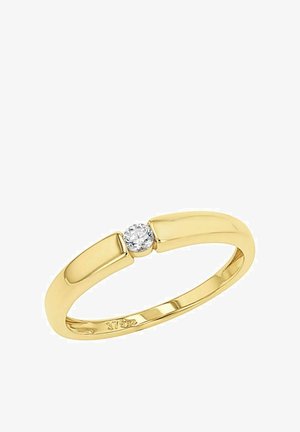 Złoty pierścionek z gładką obrączką, z okrągłym akcentem diamentowym na środku, akcentujący polerowane wykończenie i minimalistyczny design.