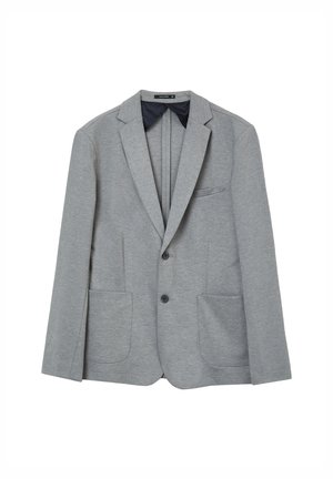 Blazer grigio chiaro realizzato in tessuto morbido, presenta due tasche frontali, chiusura con un bottone e rever a punta. La fodera interna è di colore blu navy.