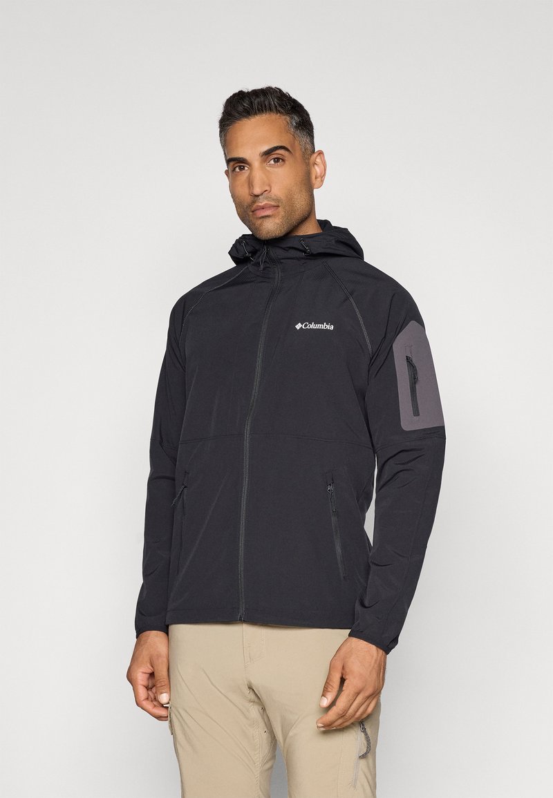 Czarna kurtka z kapturem i zamkami, z szarym akcentem na górnej części rękawa oraz odblaskowym logo. Wykonana z lekkiego, oddychającego materiału.