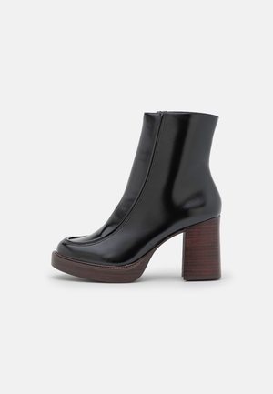 Bottines à talons hauts - black