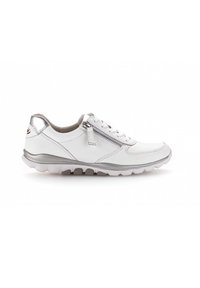 White leather sneaker with silver accents, lace-up design, side zipper, textured sole, and a rounded toe. Soft inner lining for comfort.