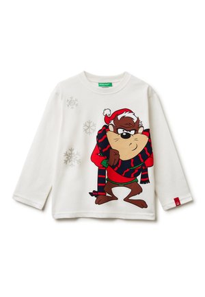 White long-sleeve shirt featuring a cartoon character in a Santa hat, holding a striped scarf. Snowflake patterns are subtly printed.