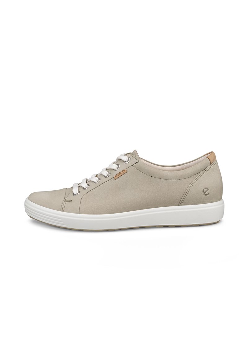 Beige sneaker with smooth leather upper, white rubber sole, and round toe. Features contrasting tan heel accent and lace closure.