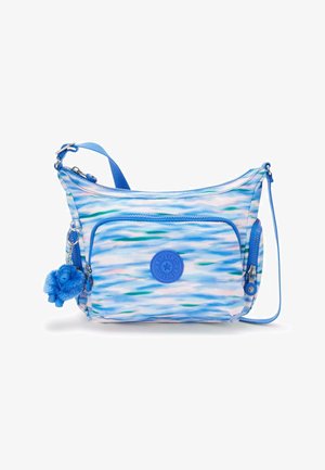 Modrá crossbody taška s potiskem, nastavitelným popruhem, přední kapsou a chlupatým klíčenkou ve tvaru opice. Vyrobena z odolné tkaniny s hladkým povrchem.