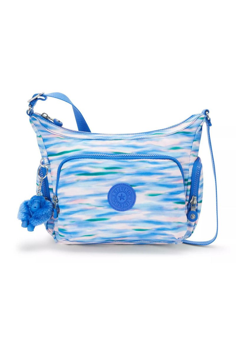 Blå mønstret crossbody taske med justerbar rem, frontlomme og fuzzy abekat nøglering. Lavet af holdbart stof med en glat overflade.