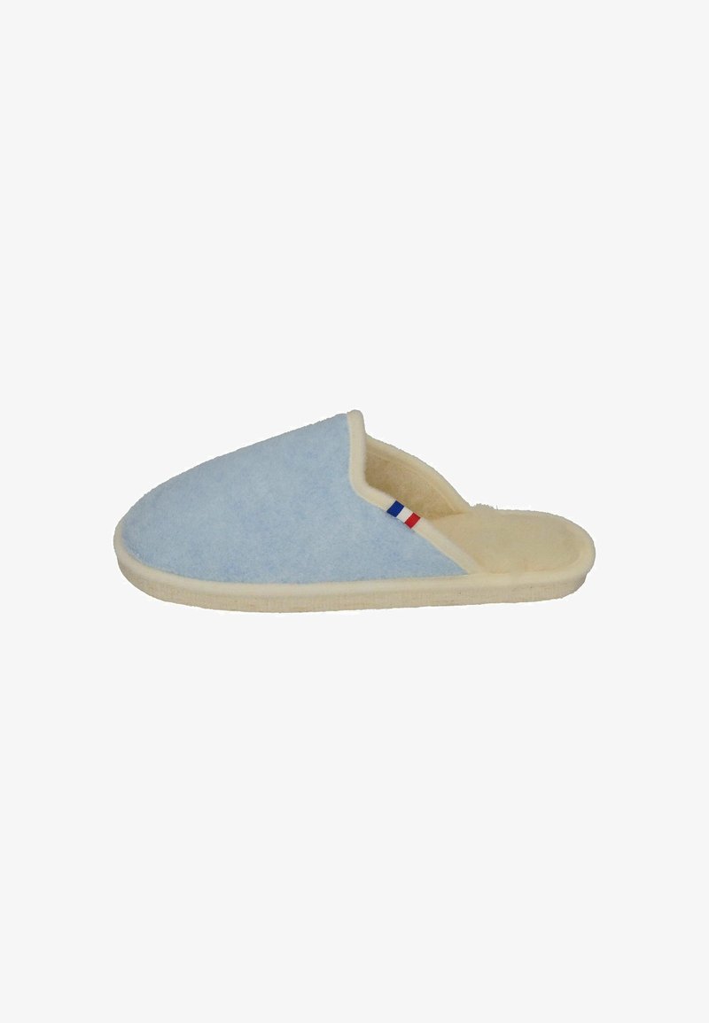 Blue wool slippers with a soft beige lining, rounded shape, and cream-colored sole. Features a small red, white, and blue striped accent.
