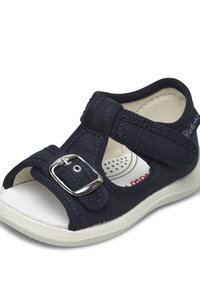 Námořnické plátěné sandály s otevřenou špičkou, nastavitelním popruhem se sponou a bílou gumovou podešví. Obsahují polstrovanou stélku s ventilačními otvory.