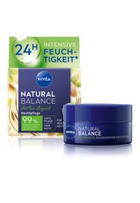 NIVEA Natural Balance night cream in a blue jar with white text, surrounded by a green and white box. Features argan oil and 24-hour hydration.