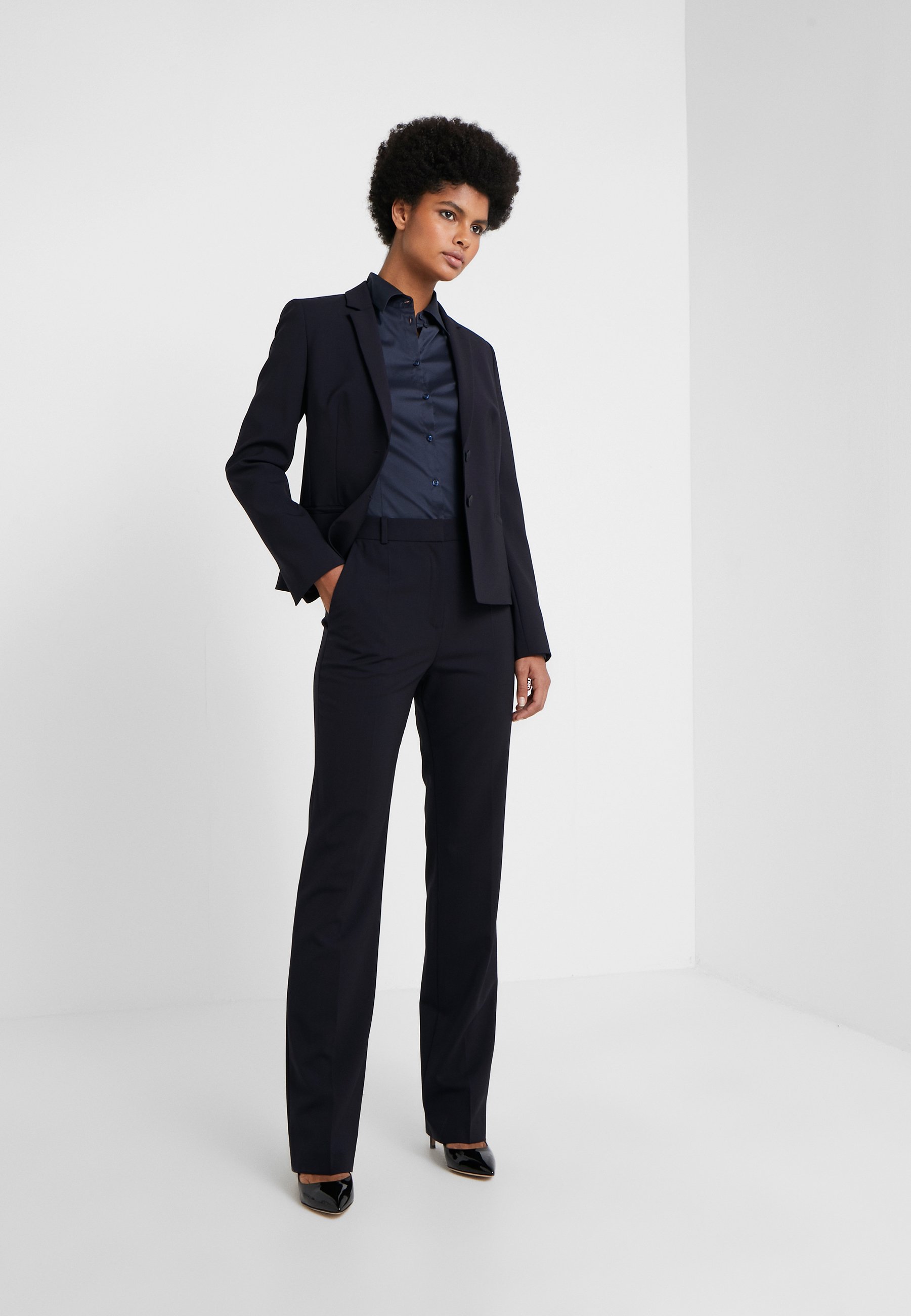 REGULAR TROUSERS - Trousers - navy 