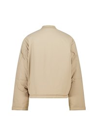 Beige cropped puffer jacket with long sleeves, ribbed collar, and smooth texture. Minimalist design, no visible hardware or embellishments.