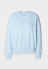 Light blue sweatshirt with embroidered "Marc O'Polo" logo. Features ribbed cuffs and hem, soft texture, and dropped shoulder design.