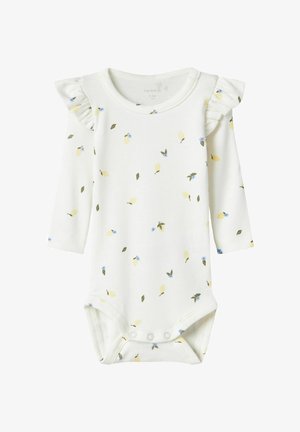 White long-sleeve onesie with small floral and leaf patterns. Features ruffled shoulder accents and snap closures at the bottom. Soft material.