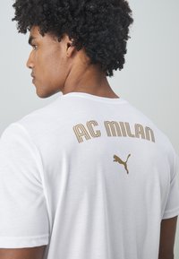 Puma AC MILAN CASUALS TEE - Sports T-shirts - white/red