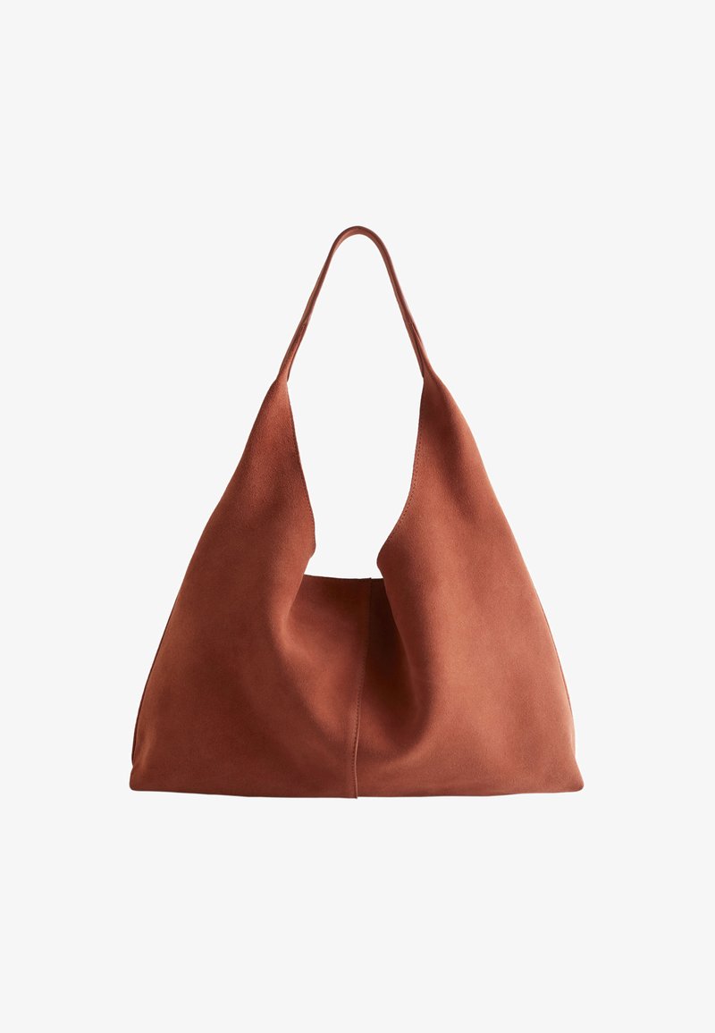 Braune Wildleder-Hobo-Tasche mit einer weichen, entspannten Silhouette, weichem Einstieg und einem langen, einzelnen Henkel. Minimalistisches Design, keine sichtbaren Beschläge.