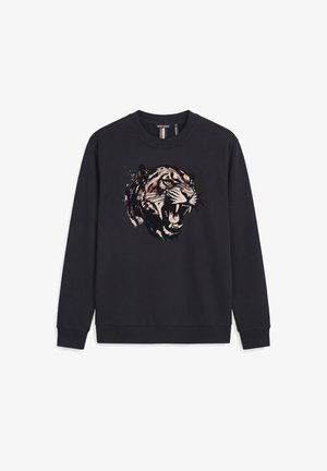 Sudadera negra de manga larga con un gran gráfico frontal de una cabeza de tigre rugiente en tonos beige, blanco y negro, centrada en el frente.